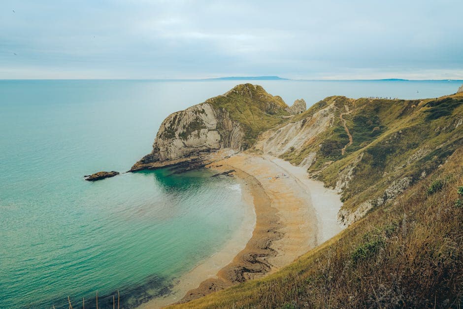 Breathtaking aerial view of Lulworth Cove's iconic coastal landscape in Dorset, England