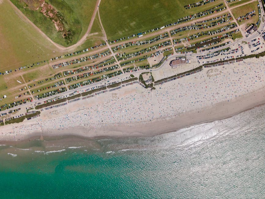 Bournemouth beach and pier on a sunny bank holiday weekend