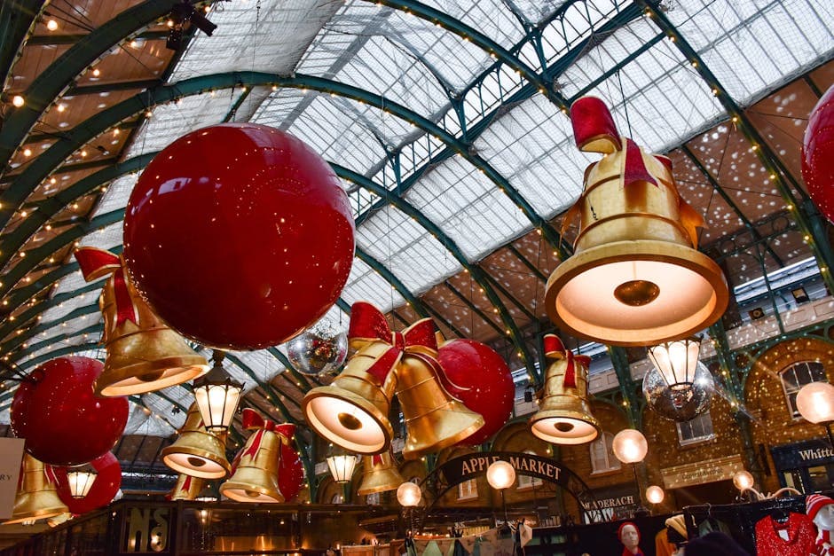 Christmas decorations and large ornamental baubles adorning a festive market in London
